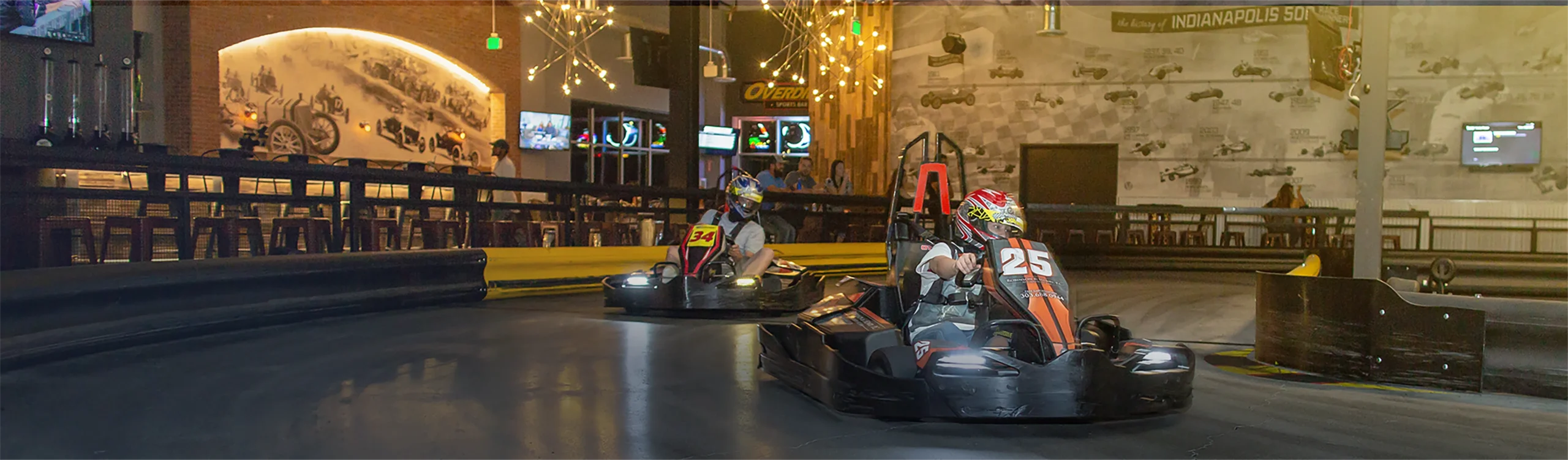 A banner image of gokart racers on an indoor track